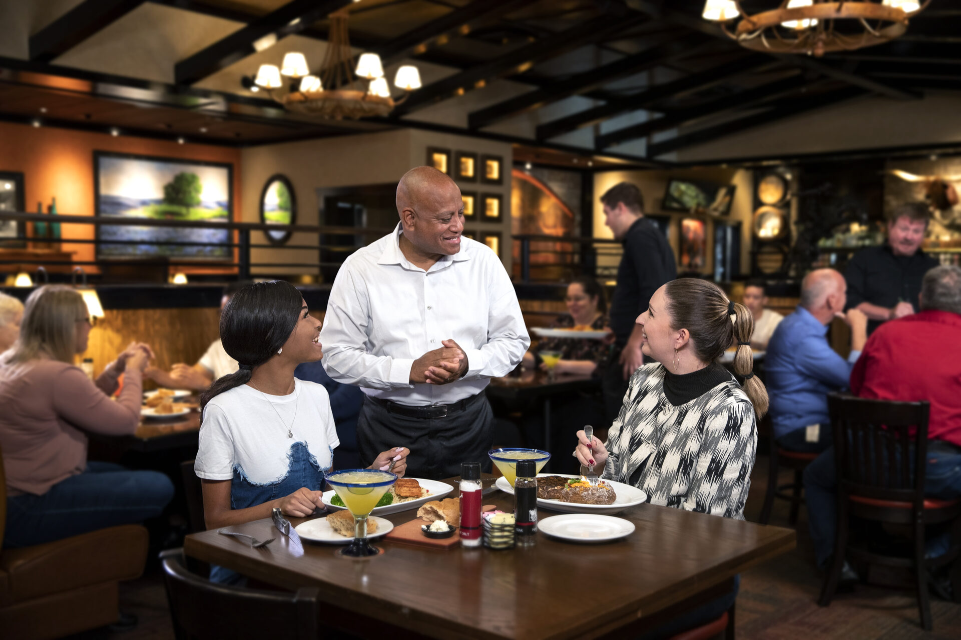 Manager talking to guests