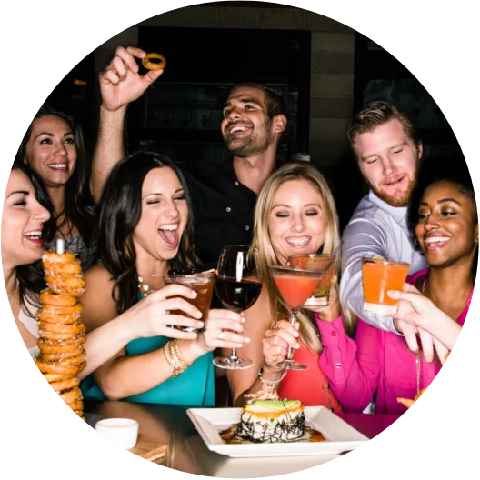 Guests celebrating over food and drinks